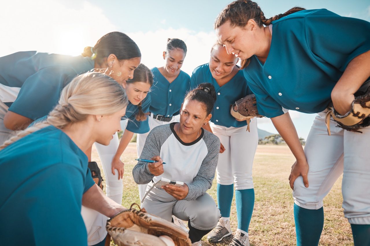coach-of-girl-team-in-softball-planning-with-players-before-match-or-game-trainer-of-woman-baseba.jpg